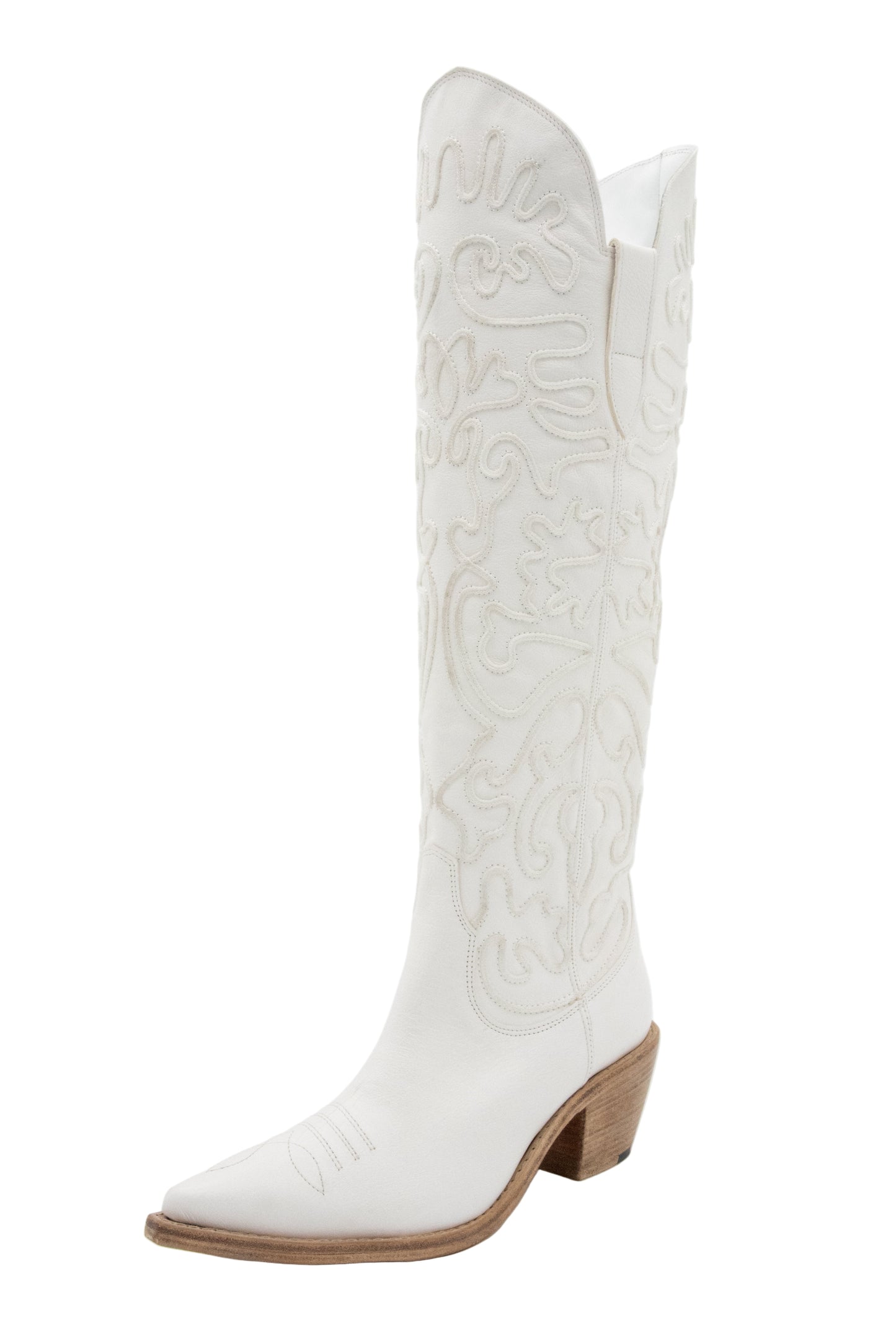 White cowboy boot with embossed design on a white background